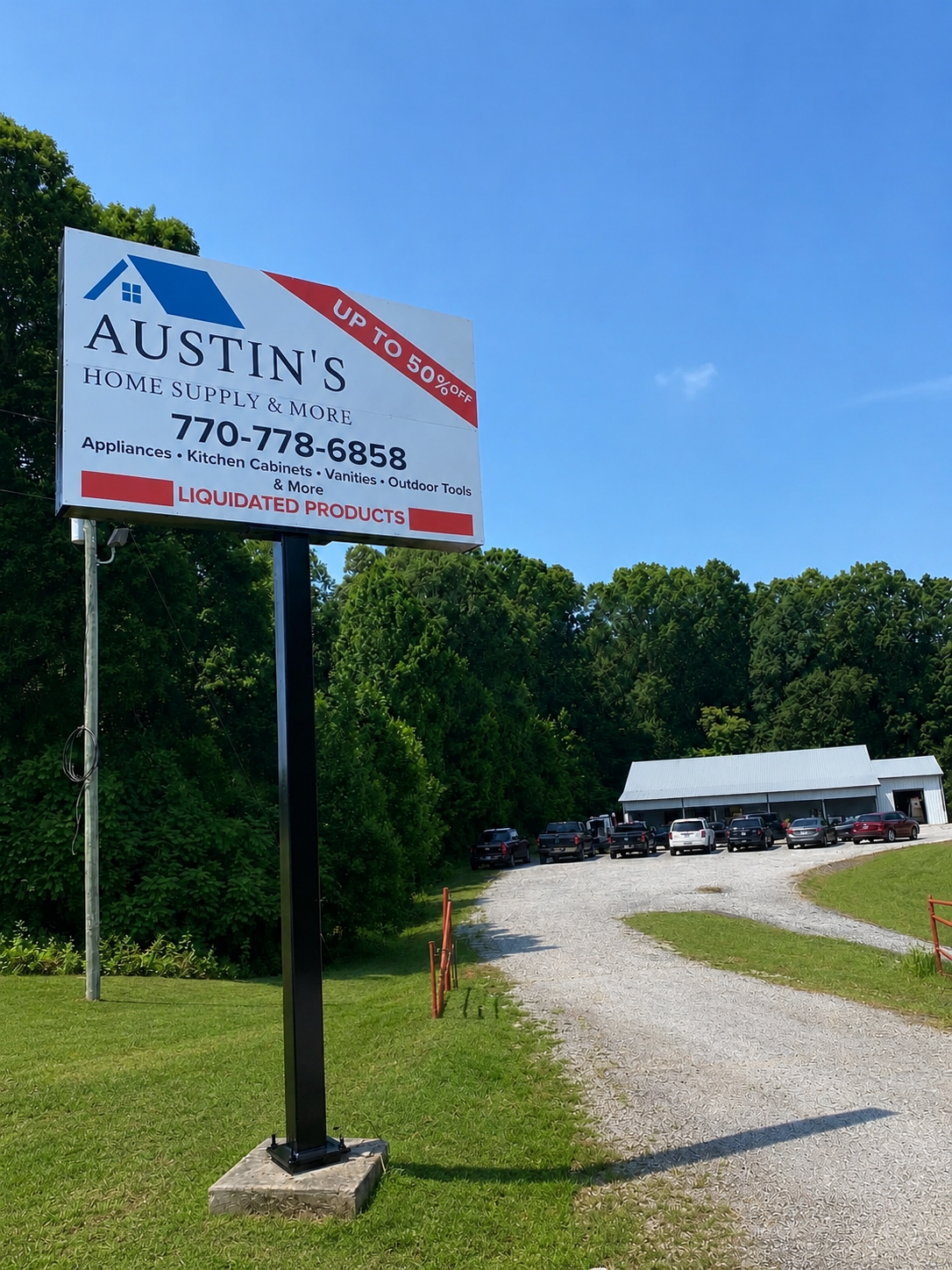 Roadside sign and storefront of Austin's Home Supply & More on Highway 441 South in Commerce, Georgia